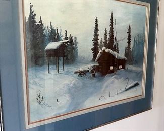Framed winter landscape art in the hallway.