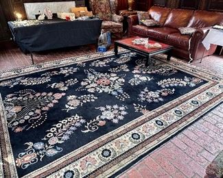 Large wool area rug.