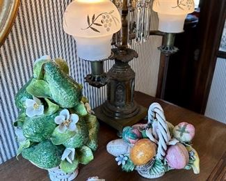 Capodimonte pieces and heavy brass lamp with prisms.