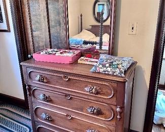 Another antique dresser and sewing notions.