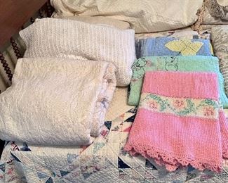 Quilts, coverlets and many hand crocheted lace coverlets.