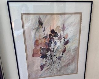 Framed contemporary floral artwork.