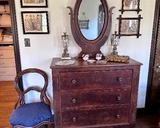 3-drawer dresser with oval tilting mirror.