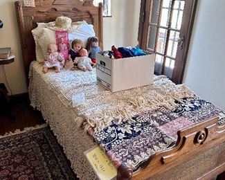 Antique twin Victorian bed.