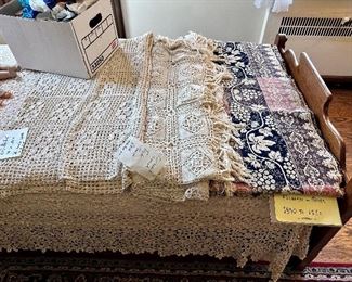 Handmade bed coverlets.