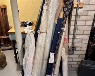 Bolts of upholstery fabric.