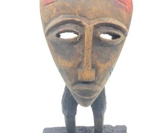 African Wooden Tribal Mask On Legs
