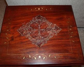 hand-carved; marquetry inlay