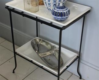 Two tier iron and ceramic stand