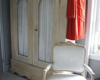 Traveling armoire ; French style armchair