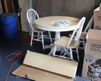 Small kitchen table with four chairs  