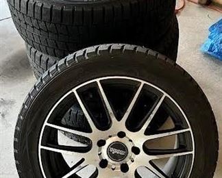 4 snow tires and rims
Tires size 245/45/R18
Rims fit a General Motors car
TPS units installed on all 4 rims