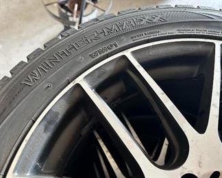 4 snow tires and rims
Tires size 245/45/R18
Rims fit a General Motors car
TPS units installed on all 4 rims