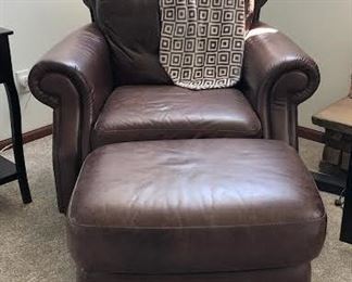 NATUZZI LEATHER CHAIR AND OTTOMAN