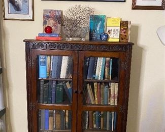 Beautiful oak antique book, case with glass front. Beautiful bronze hardware. Tons of great books. Some of Captain John’s photography.