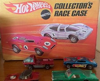 Green 1968 Hot Wheels Redline Continental Mark III, Red 1967 Hot Wheels Redline Python, Red 1969 Hot Wheels Redline - The Heavyweights Tow Truck, 1969 Hot Wheels Redline Tom McEven Mongoose II