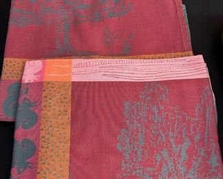 A Pair of Colorful Squirrel Themed Table Cloths