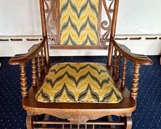 Ornately Carved, Upholstered Rocking Chair