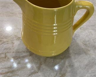 Large antique yellow stoneware pitcher