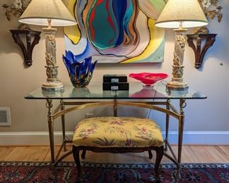 LOVE this large oil on canvas, by Amy Dandy! Flanked by a pair of antique gilt 5-light candelabras, w/milk glass flowers, pair of contemporary table lamps, brass/glass console table, bergere chair ottoman, two black lacquer boxes, w/MOP pavé inserts and pair of hand-blown art glass vases and bowls.