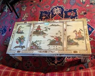 Close-up detail of the hand-painted Asian coffee table.