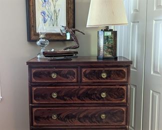 Gorgeous flame mahogany 5-drawer English chest, Asian tole table lamp, vintage wooden boat, kerosene lamp, carved art on stand and nicely framed/matted original watercolor, by Marietta artist, Helen Schneeberger, "Early Spring", 1923-2018.