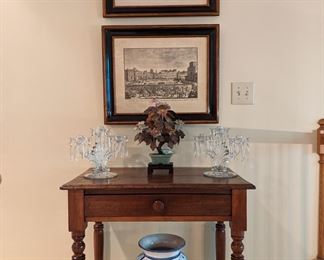 Antique American pine table, w/turned legs, single drawer and wooden knob, pair of vintage 3-light crystal candelabra, by Heisey, asian jade tree in cloisonné pot, on wooden stand and pair of Maitland-Smith framed/matted architectural prints, with Italian glazed ceramic vase.