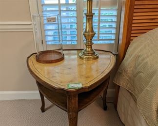 MCM tooled butter-leather topped triangular side table.