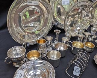 Part of the sterling silver holloware collection, sterling baby cups, English toast rack and cordials.