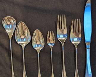 Detail of the 1960's Reed & Barton MCM "Lark" sterling silver flatware.
