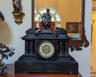 Monumental antique black slate and bronze Italian clock, measuring 1' 21" long x 1' 23" to the top of the bronze figure. The bronze figure atop this clock is Lorenzo de Medici - "Banker, de facto ruler of the Florentine Republic and the most powerful and enthusiastic patron of Renaissance culture in Italy . Also known as 'Lorenzo the Magnificent' by Contemporary Florentines, he was a magnate, diplomat, politician and patron of scholars, artists and poets".