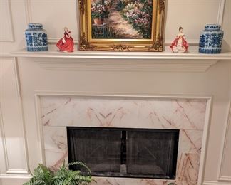 Obligatory master bedroom fireplace, w/blue/white Asian ginger jars, vintage blue/white porcelain English tub, w/handles, basket of green fishing floats, fake fern and pair of highly sought after Royal Doulton porcelain figurines.