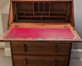1930's "Linen Fold" oak drop-front desk, opened for detailed inspection reports.