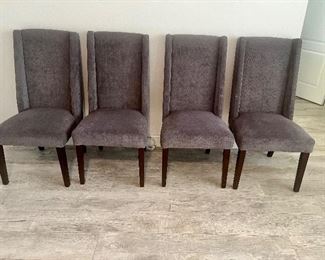 4 high back well cared for chairs 