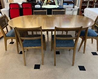 Vintage Dining Set!  3 leaves, 6 chairs, table cover and glass that fits over the (round) table without leaves.  SO NICE!  Totally extended it is 80" x 44"