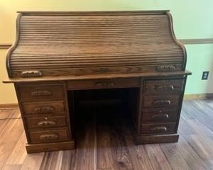Beautiful, big Rolltop Desk. Key included. 60"W x 46"H x 36"D. More photos follow.