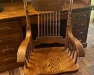 Matching rolling wood carved chair for desk