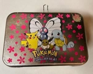 Pokeman collector's tin with all cards