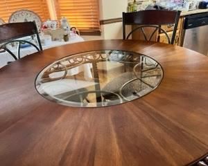 Top detail of kitchen table. Glass is tempered and shatter resistant, and removable for cleaning.