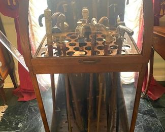 Collection of antique walking sticks/canes and display case (sold separately)