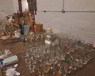 Good assortment of glassware, quart bell jars with handles, pitchers. 