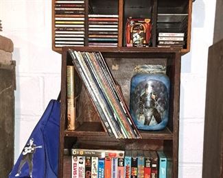 A little Elvis collection -Monopoly, VHS and CD's, some books and a jar. 
