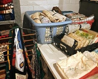 Quite a few linens never opened. Many aprons. 