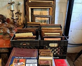 Picture binders, picture frames, some framed art. 