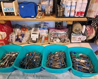 More scissors, cleaners, air freshener and other health care tools and supplies. 