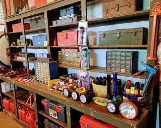 Wall full of tool boxes and small item organizers- only part of the collection. 