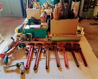 Plumbers wrenches, hammers, vintage hand drill  and more. 
