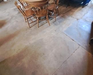 One of several round kitchen tables with chairs availalble