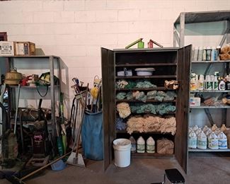 Absurdly large collection of mop heads, mops, cleaning supplies, vacuum cleansers ,brushes, room deodorizers, spray bottles, stainless steel cleaner.  Raid the store room and start cleaning!