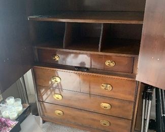 Doors open on upright Dresser